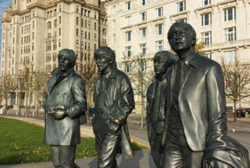 Staturen der Beatles.