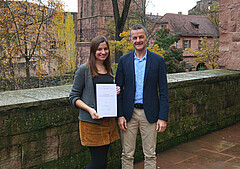 Sandra Kiebler und Markus Lang vor dem Heidelberger Schloss.