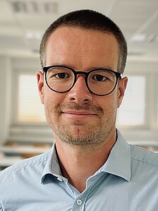 Portraitfoto von Christian Mühleis