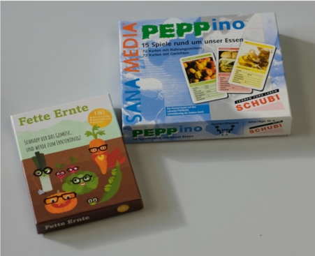 Stellvertretend für eine Vielzahl anderer Lernspiele, die es in der Didaktischen Werkstatt AUG auszuleihen gibt, sieht man das Spiel Fette Ernte und Peppino.