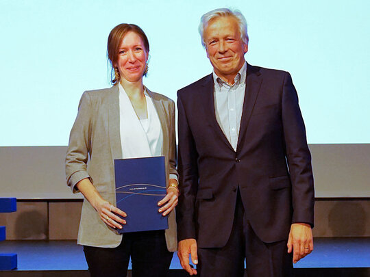 Gruppenbild von Katrin Schweizer und Karl-Heinz Dammer